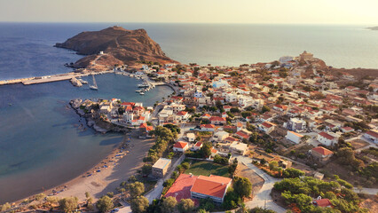 Aerial drone photo of picturesque and historic main village of Psara island featuring landmark church of Saint Nikolas, North Aegean islands, Greece © aerial-drone