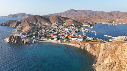Fototapeta premium Aerial drone photo of picturesque and historic main village of Psara island featuring landmark church of Saint Nikolas, North Aegean islands, Greece