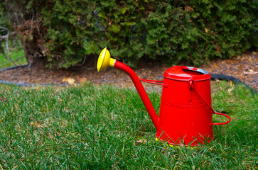 Retro Style Red and Yellow Watering Can © Hamilton Productions