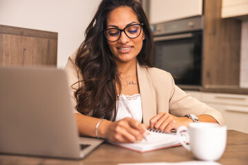 Young Indian Woman Working At Home