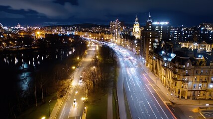 Bustling cityscape at night with illuminated streets and buildings