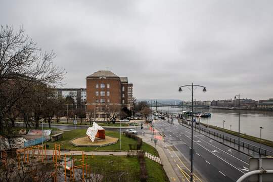 Budapest, Hungary - January 22, 2023: Outdoor gym, skatepark, boulder wall, and Duna River in front of Building R (R &eacute;p&uuml;let), Műegyetem rakpart 7-9.