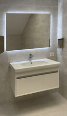 Washbasin with faucet in modern bathroom