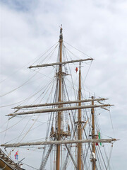 The masts and rigging of a traditional sailing vessel