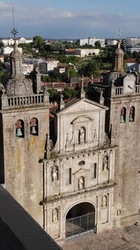 Viseu, Portugal - May 8, 2021: DRONE AERIAL FOOTAGE - The Viseu Cathedral (Se Catedral de Viseu) is the Catholic bishopric seat of the city of Viseu, in Portugal. 
