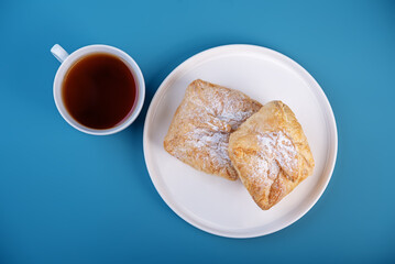 Cottage cheese puff cake on a blue background