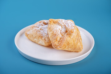 Cottage cheese puff cake on a blue background