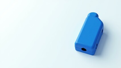 Fototapeta premium Cobalt blue lie detector on right. Blue asthma inhaler isolated on whi