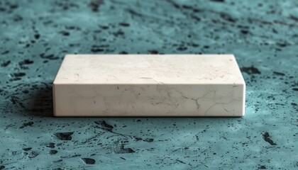 A white box sits on a blue surface