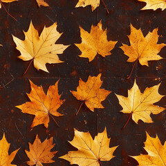 Autumn leaves on brown seamless background texture