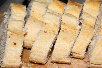 Close Up of Fresh Baked Golden Bread Crusty Tiger Baguette Sliced Cut  Roll