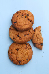 chocolate chip cookies on blue background