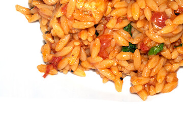 Close Up of Tomoto Based Orzo Rice Sauce Dinner Snack Dish on a White Background