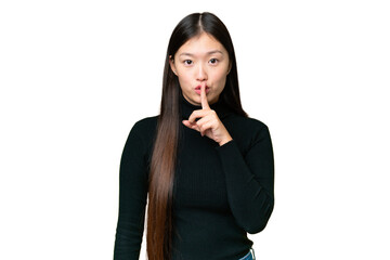 Fototapeta premium Young Asian woman over isolated chroma key background showing a sign of silence gesture putting finger in mouth