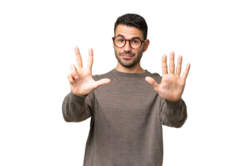 Young handsome caucasian man over isolated background counting eight with fingers