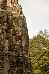 Fototapeta premium Face made of stones in the Angkor Wat complex in Siem Reap, Cambodia