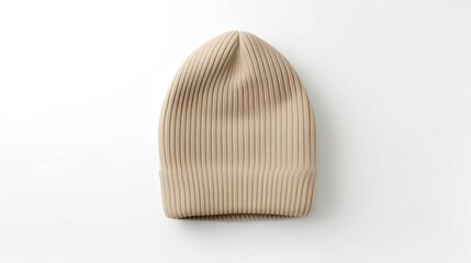 A tan knit beanie hat is sitting on a white background