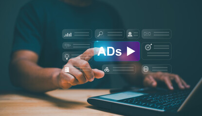 Digital marketing commerce online sale concept, Businessman using laptop with Ads dashboard. Advertising marketing strategies. ADs on website and social media. ADs video banner to target. Planning.