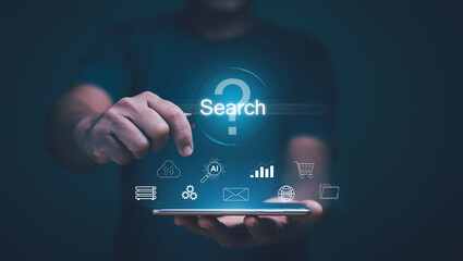 Concept of finding an answer questions in business and lifestyle, Businessman holding magnifying glass with question marks icon for business various information. Creative idea, data, Service.