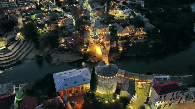 Aerial view on the Old Bridge in Mostar at night, Bosnia and Herzegovina, 4k