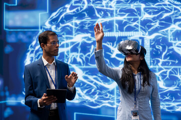 Specialist doing VR headset demonstration at AI tech conference gathering experts seeking to discover latest innovations. Engineer presents how virtual reality can be leveraged to improve businesses