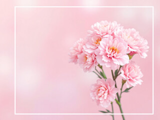 Pink flowers with decorative frame.