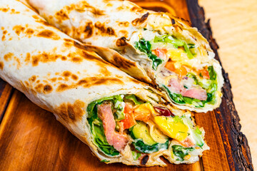 Delicious wrap filled with fresh vegetables and savory ingredients