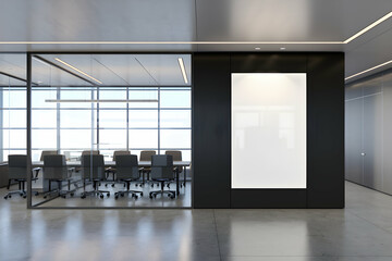 A sleek office with a glass partition reveals a modern conference room
