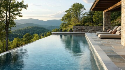 Infinity pool overlooks mountain sunset, luxury patio