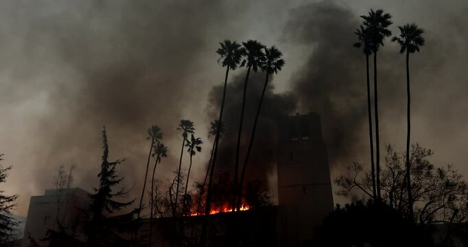 Altadena, California, USA - January 8, 2025: Aided by extreme Santa Ana wind conditions, the Eaton Fire engulfs a church in downtown Altadena.