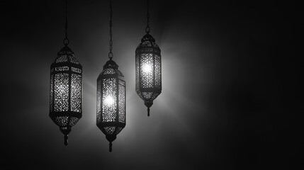 Obraz premium Illuminated lanterns hanging, dark background, Ramadan celebration, festive decor