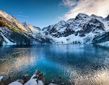 mountain peaks near morskie oko or sea eye lake in poland at winter tatras range