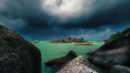 View of large stones by the sea