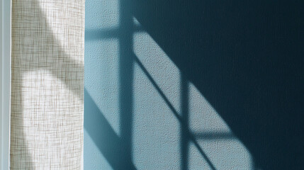 minimalist wall with faint crosshatch texture, showcasing shadows from window. interplay of light and shadow creates serene atmosphere