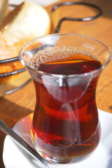 Traditional turkish tea on white table .