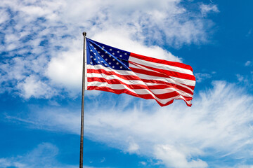 USA flag waving against sky