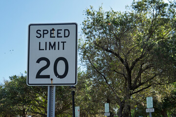 20 speed limit sign on a road