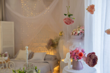 Beautiful floral interior with bed. High quality photo