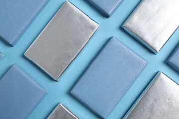 Blue chocolate bars on a blue background