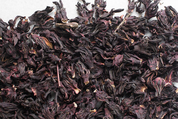Overhead view of dried roselle, top view of dried hibiscus and Sorrel flowers, ingredient for making nigerian zobo drink