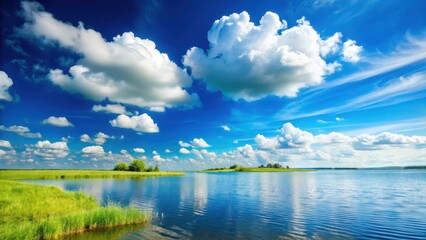 Obraz premium serene landscape with a clear blue sky background and a few scattered white clouds, landscape, sunny day