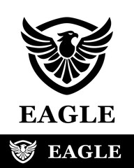 A bold black eagle logo design featuring a shield and outspread wings, symbolizing strength, power, and protection