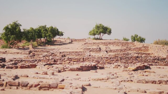 Rocky outcrops surrounding ancient ruins of Indus valley civilization in Dholavira, Kutch, India. The ancient city of Dholavira UNESCO World Heritage Centre. Archaeological site Harappan Civilization 