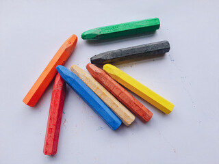 Just above the perspective The white background is separated covering the colored crayons