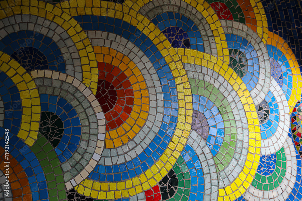 Wall mural Intricate mosaic design featuring vibrant blue white and yellow patterns in a circular format. Colorful background mosaic tile design.Colorful mosaic pattern featuring circular shapes. showcases stone