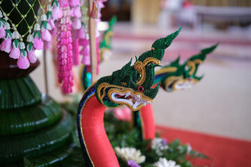 Beautiful Naga made from fabric. Naga shaped Bai Sri, or traditional Thai-style arrangement 