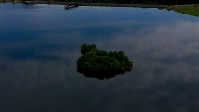 Drone footage of the Rocky Pen Reservoir (Lake Mooney) at dusk in Fredericksburg, Virginia, USA