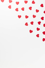 Top view of red hearts on white background. Valentine's day, red hearts, love wallpaper. Flat lay, copy space.