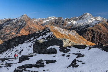 Hikers in the Central Alps with beautiful panorama, Valchiavenna, Italy