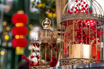 Fototapeta premium Chinese red Christmas lanterns on Tverskaya Street in Moscow. Close-up. The first ever meeting of the Chinese New Year 2024 in Moscow.